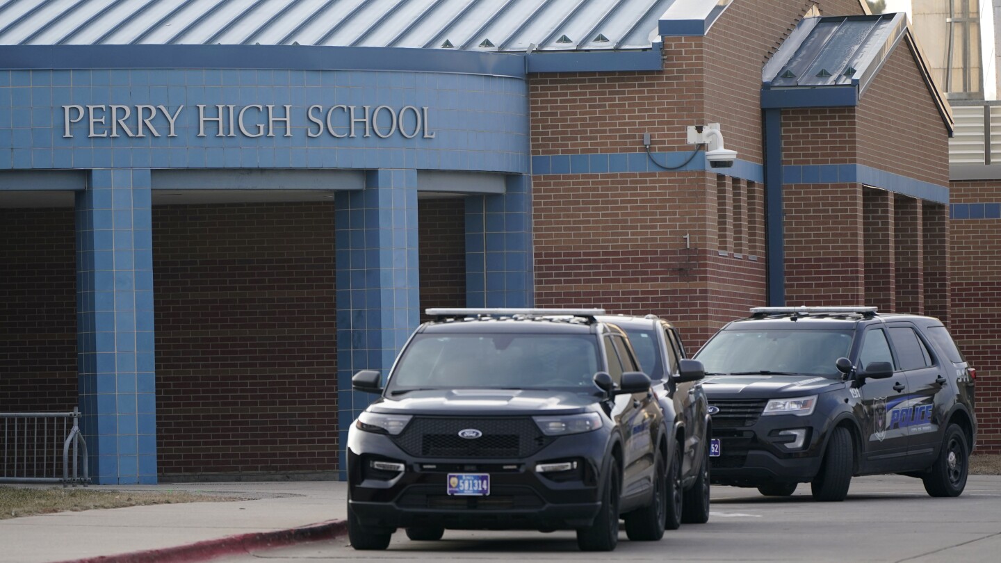 Iowa school shooting: Principal who risked life to protect Perry students has died | AP News