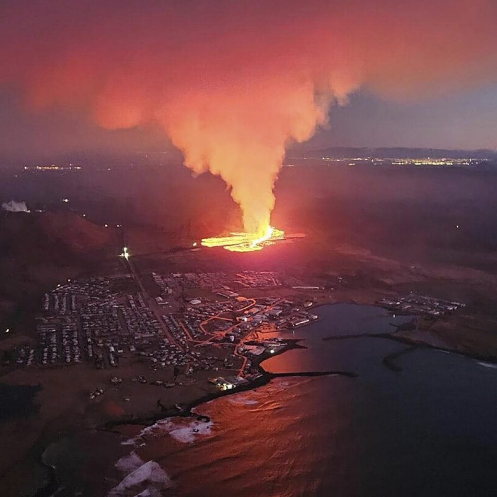 President says Iceland faces ‘daunting’ period after lava from volcano destroys homes in Grindavik | AP News