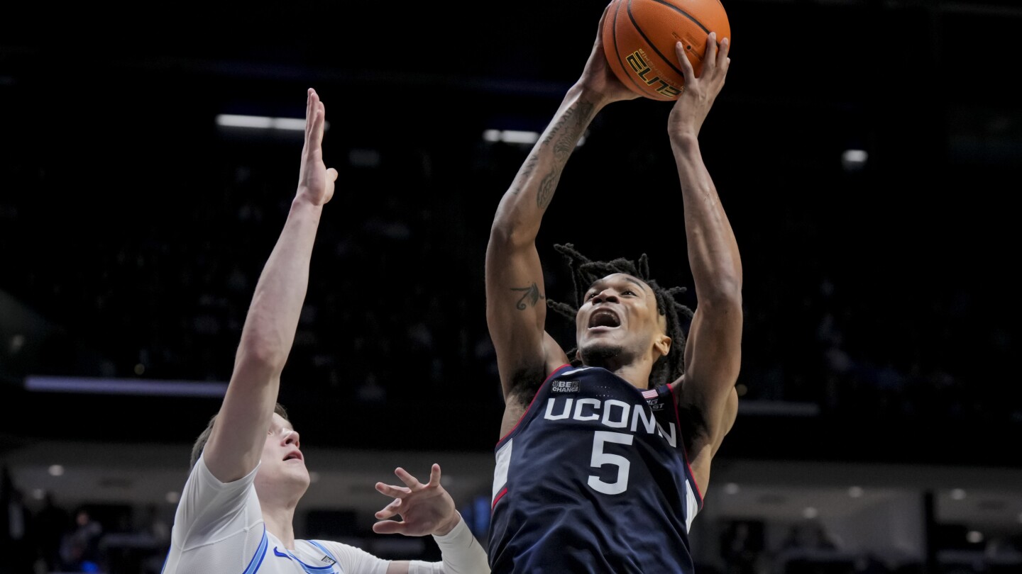 UConn hits No. 1 in AP Top 25 after week of upsets. Gonzaga out for first time since 2016 | AP News