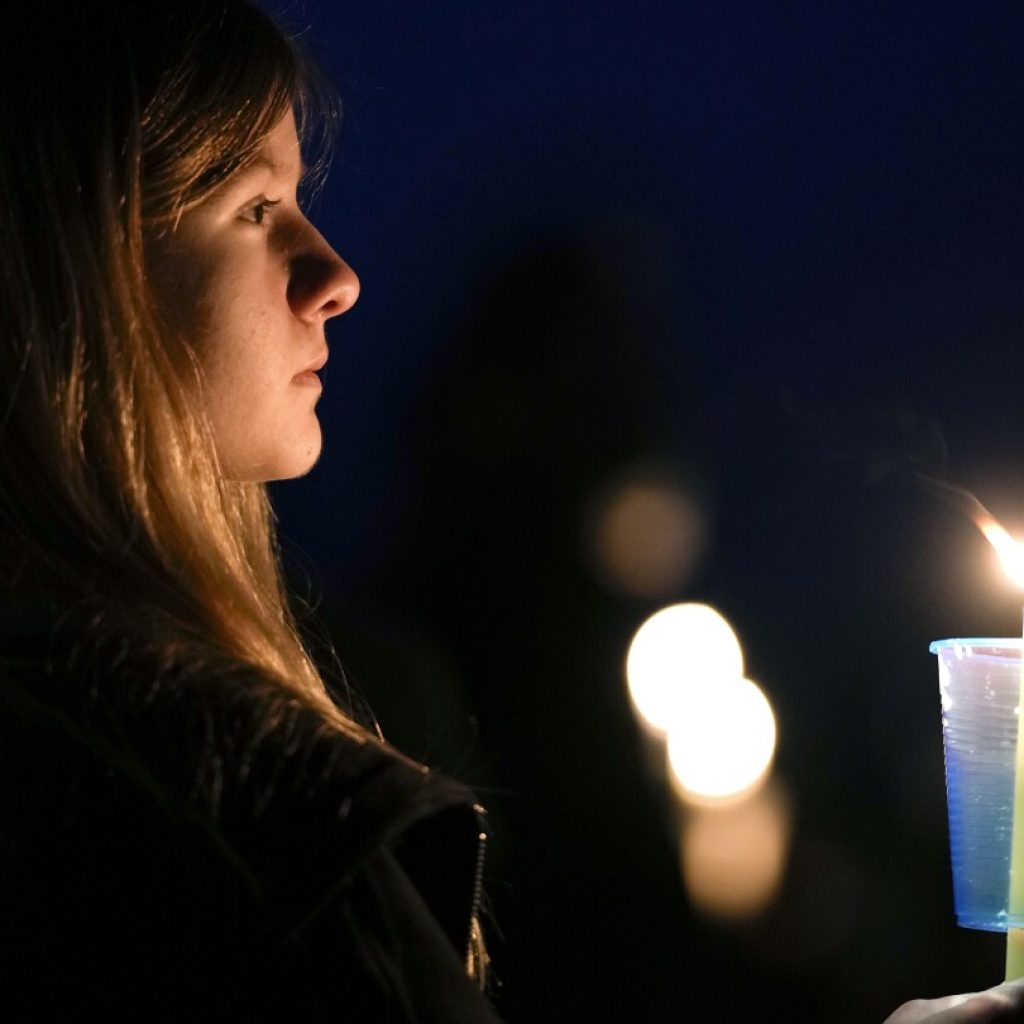 Parents want district to improve security more after deadly Iowa school shooting | AP News