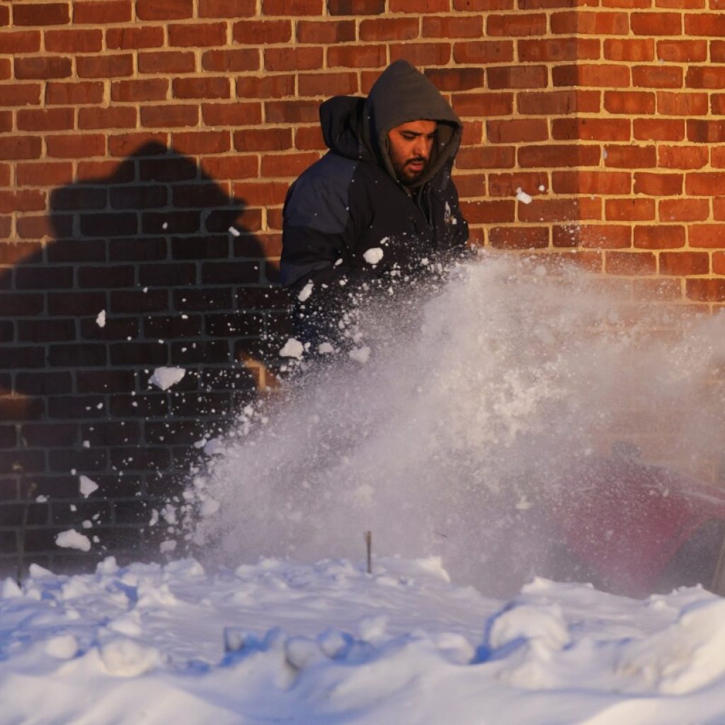 US winter storm: Schools stay shut and flights are grounded | AP News