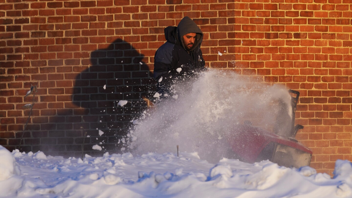 US winter storm: Schools stay shut and flights are grounded | AP News