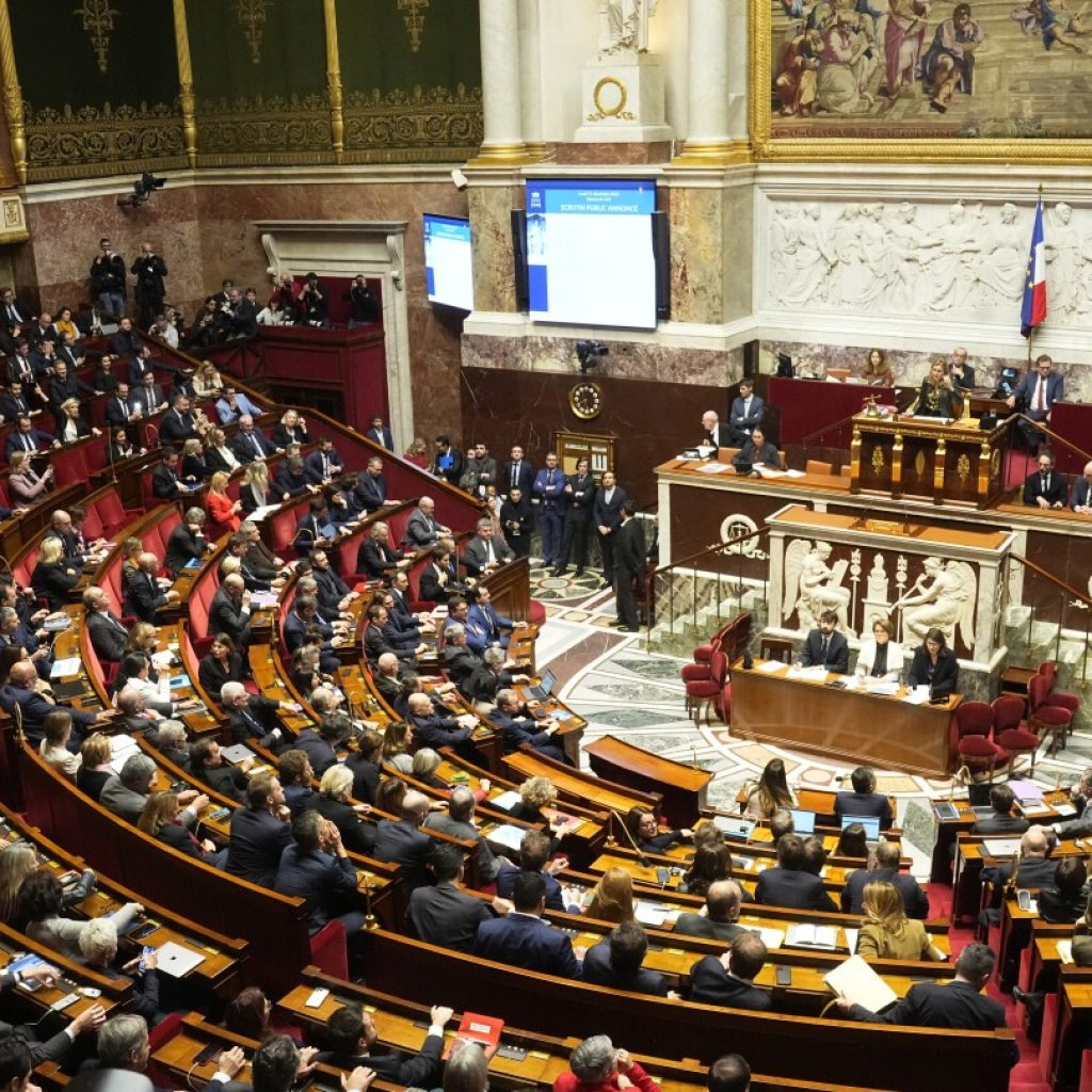 French lawmaker makes a striking comeback after accusing senator of drugging her to assault her | AP News