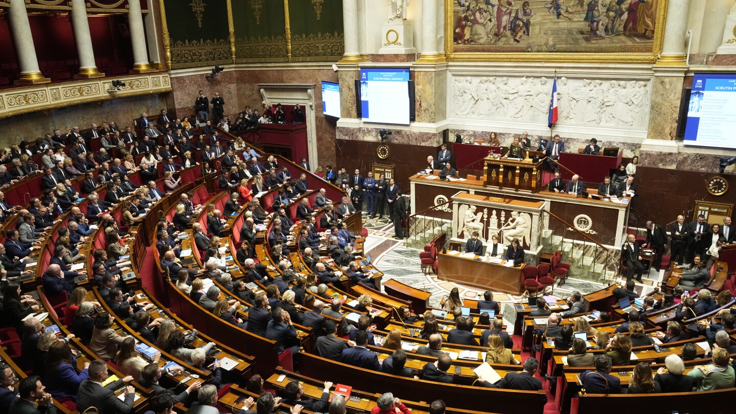 French lawmaker makes a striking comeback after accusing senator of drugging her to assault her | AP News