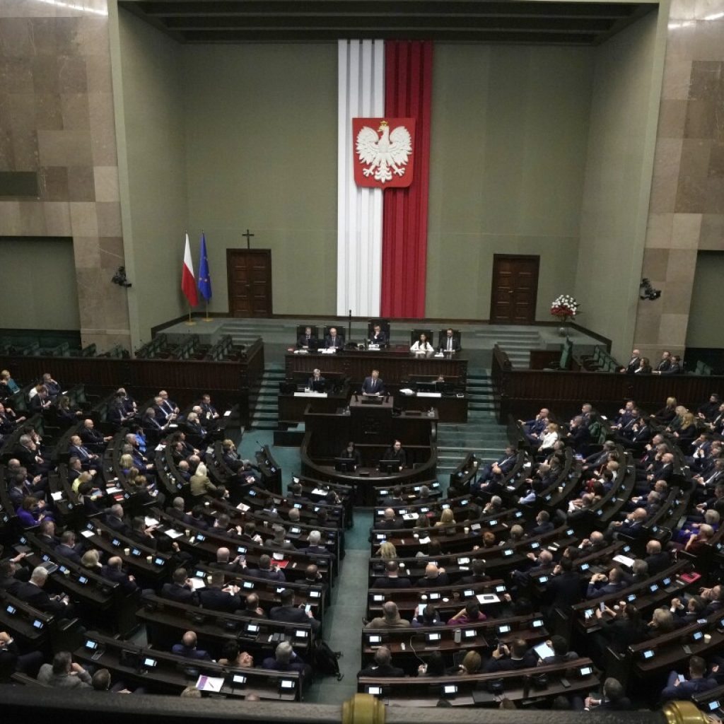 Poland’s lawmakers vote in 2024 budget but approval is still needed from pro-opposition president | AP News