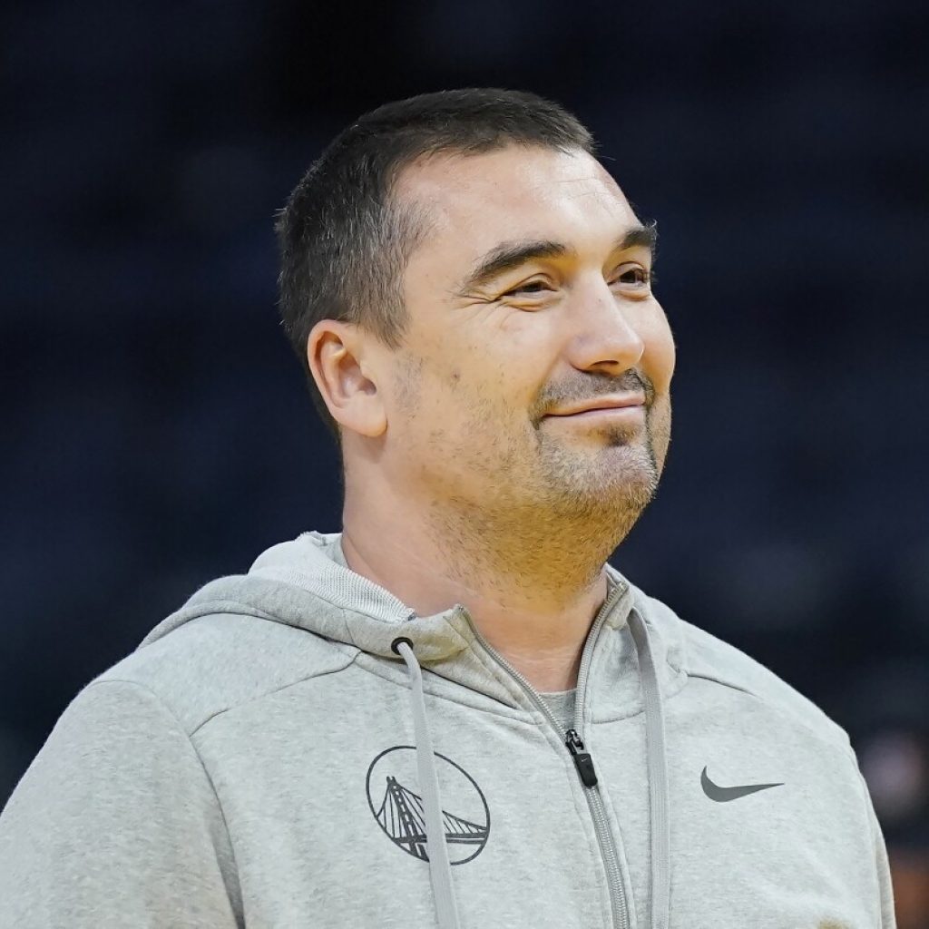 Warriors vs. Mavericks game postponed following death of assistant coach Dejan Milojević | AP News