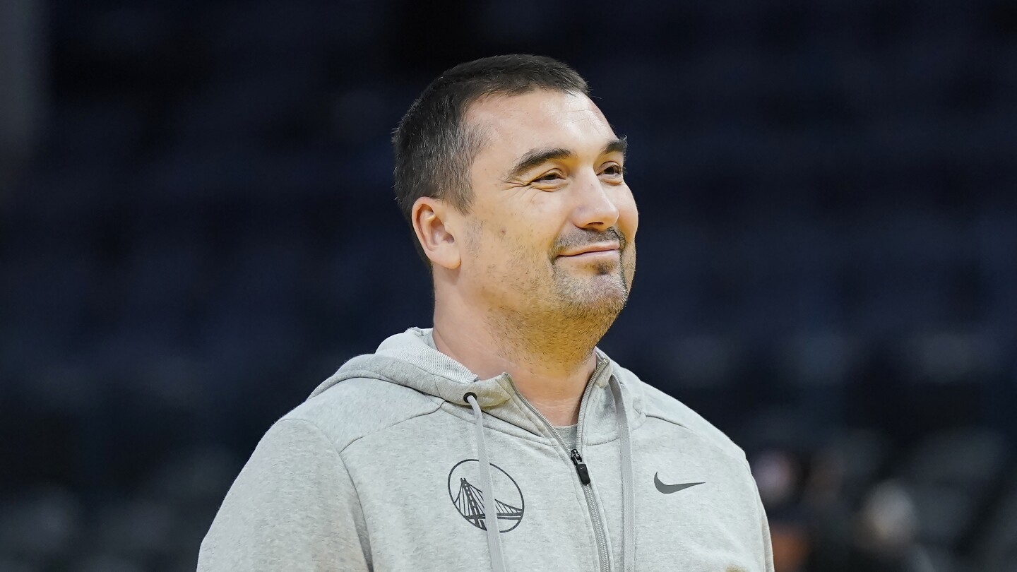 Warriors vs. Mavericks game postponed following death of assistant coach Dejan Milojević | AP News