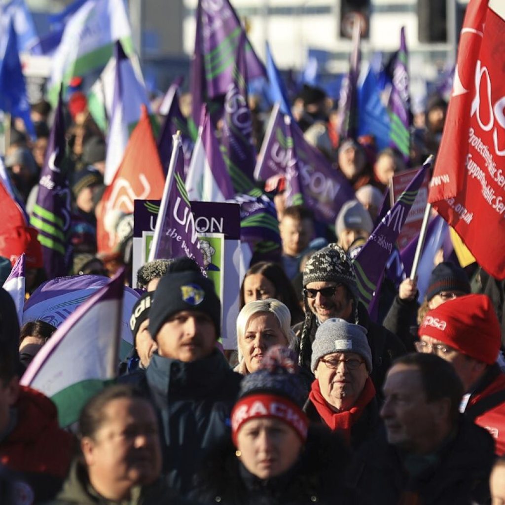 Northern Ireland sees biggest strike in years as workers walk out over pay and political deadlock | AP News