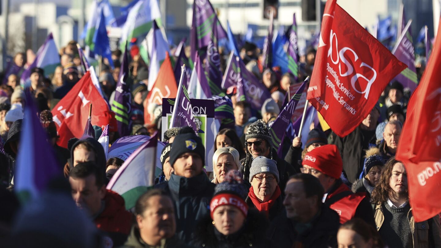 Northern Ireland sees biggest strike in years as workers walk out over pay and political deadlock | AP News