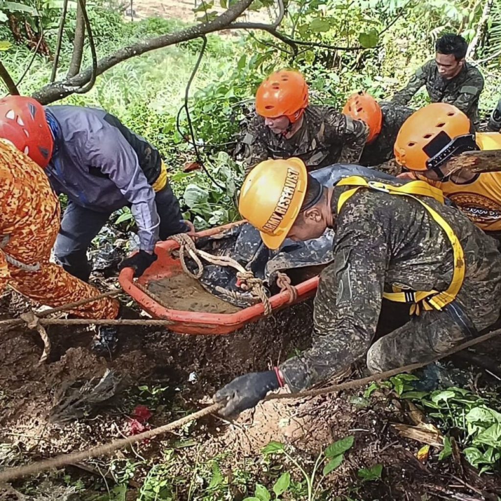 At least 7 people dead after a landslide buries a house in the southern Philippines, official says | AP News