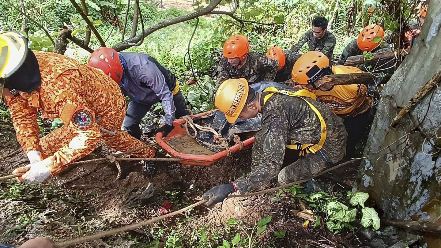 At least 7 people dead after a landslide buries a house in the southern Philippines, official says | AP News