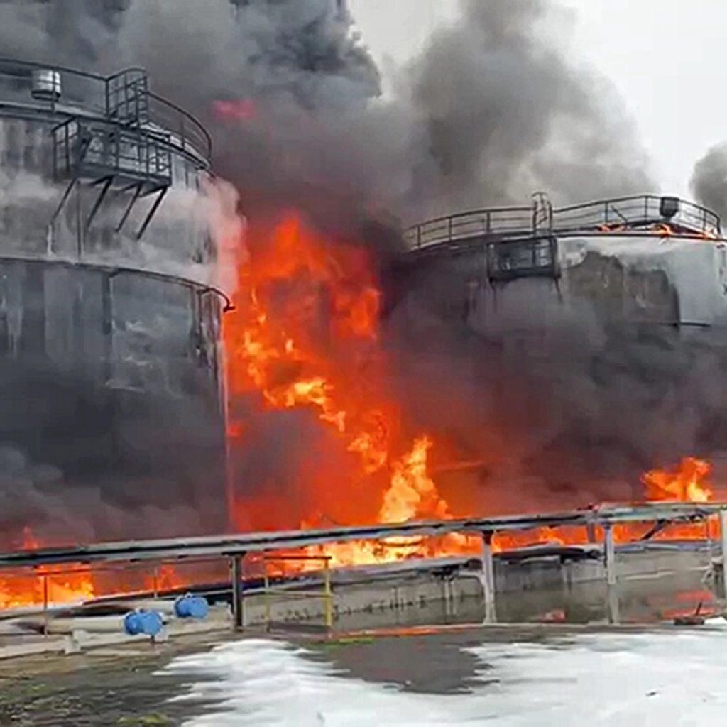 A Ukrainian drone attack on an oil depot inside Russia causes a massive blaze, officials say | AP News