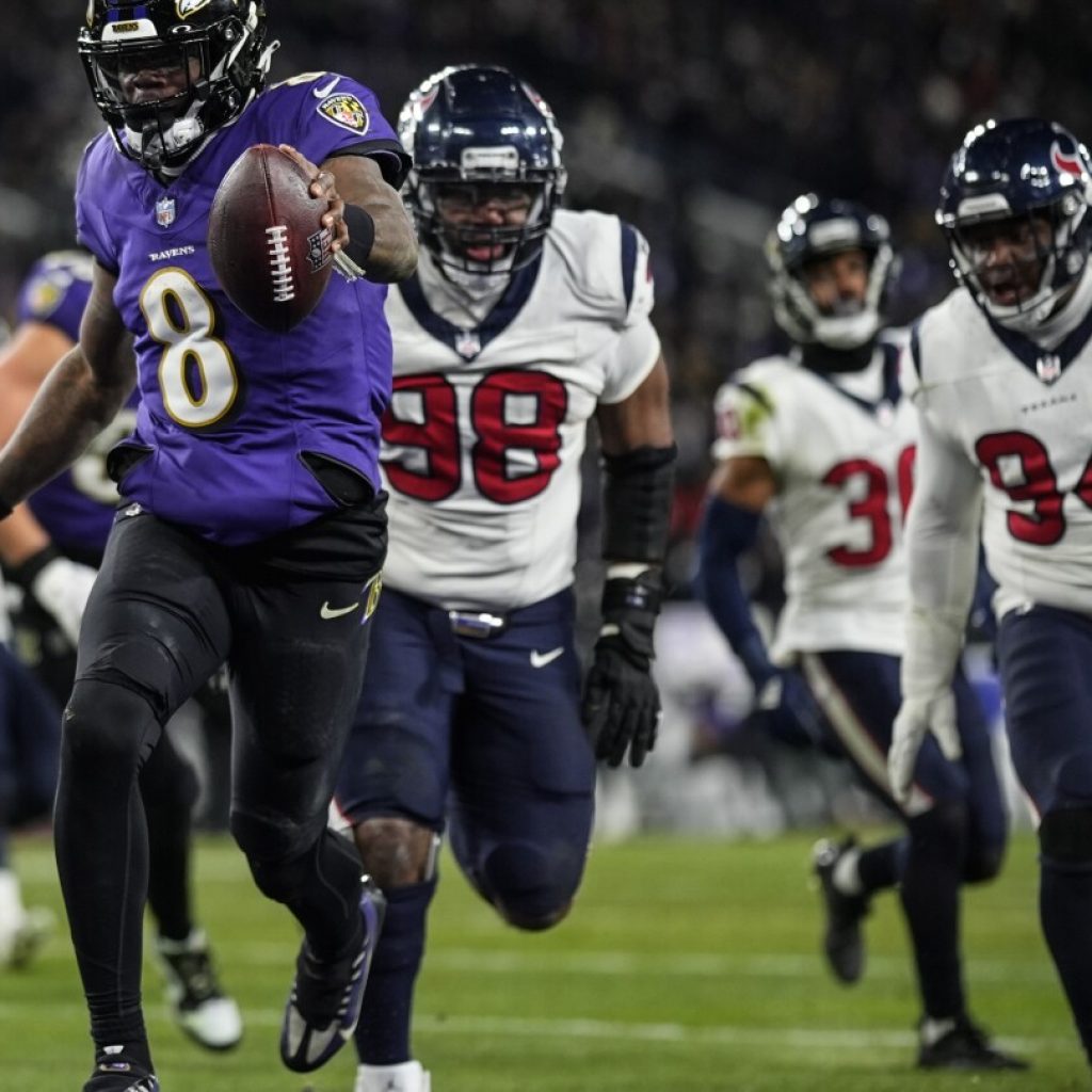 Lamar Jackson and Ravens pull away in the second half to beat Texans 34-10 and reach AFC title game | AP News