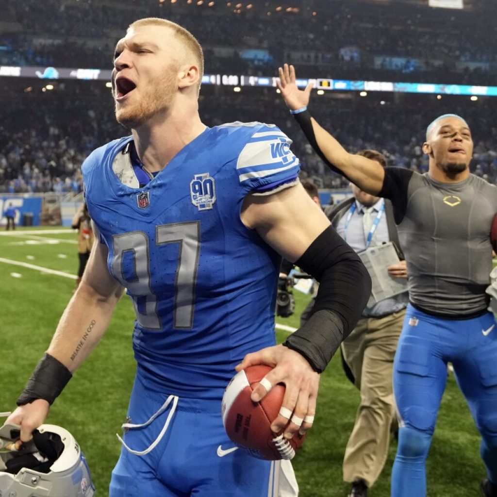 Lions host Bucs in divisional round, aiming to win 2 playoff games in season for 1st time since 1957 | AP News