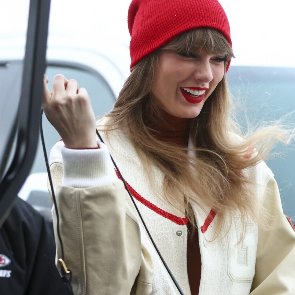 Taylor Swift’s NFL playoff tour takes her to Buffalo for Chiefs game against Bills | AP News