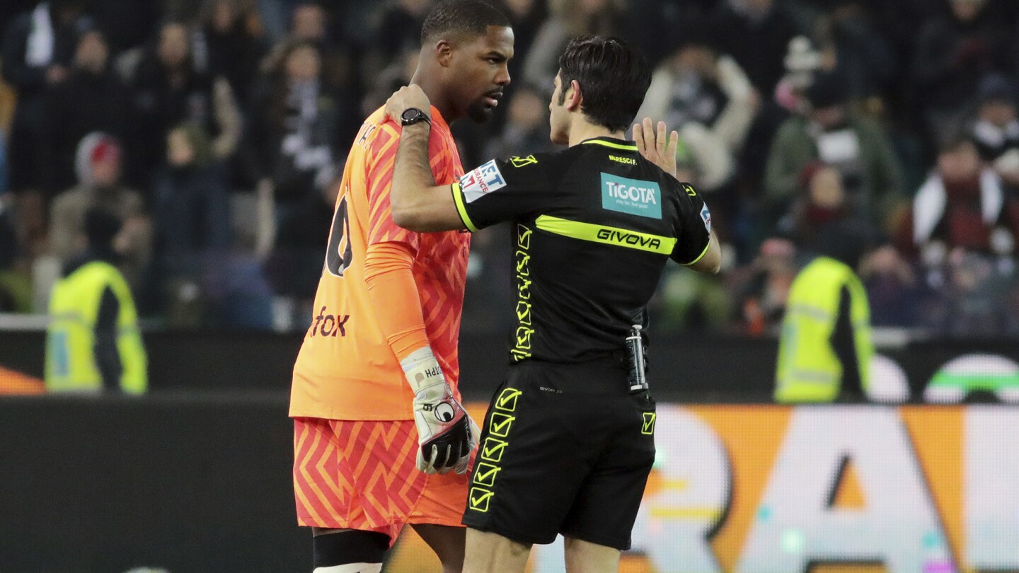 Udinese bans for life one of the fans who racially abused Milan goalkeeper Mike Maignan | AP News