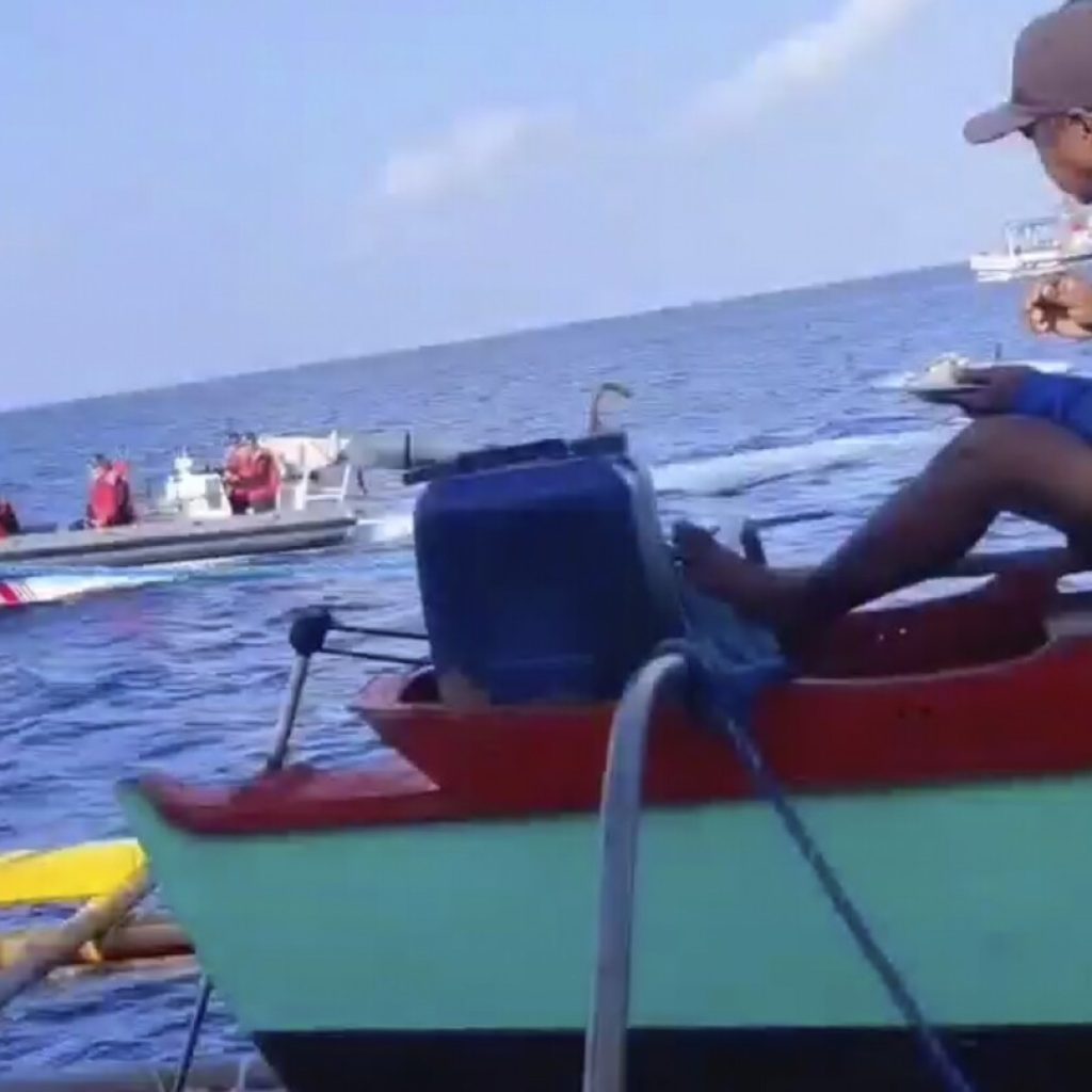 Filipino fisherman to Chinese coast guard in disputed shoal: `This is not your territory. Go away.’ | AP News