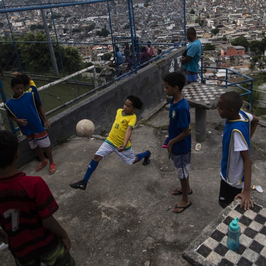 Brazil’s official term for poor communities has conveyed stigma. A change has finally been made | AP News