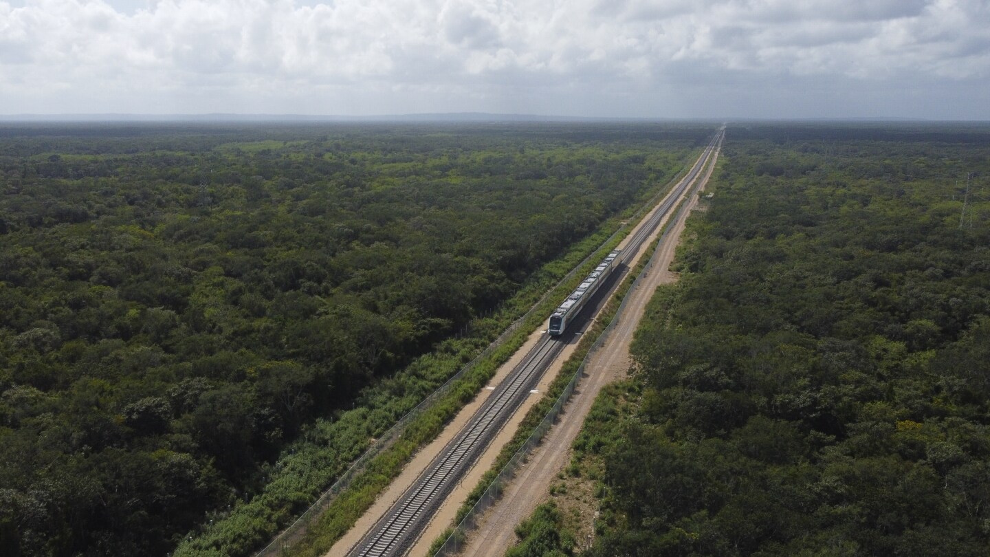 Mexico’s Yucatan tourist train sinks pilings into relic-filled limestone caves, activists show | AP News