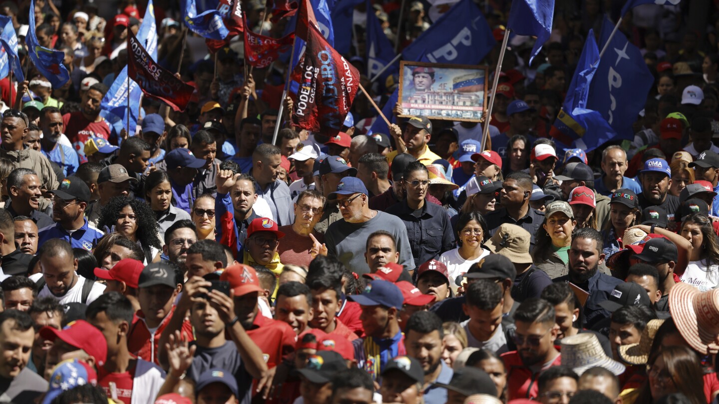 Dueling political factions demonstrate in Venezuela’s capital as presidential election race heats up | AP News