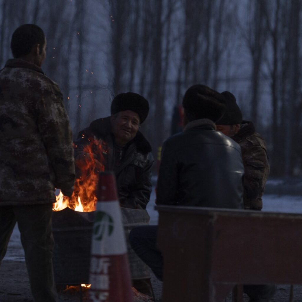 Thousands of people are forced out of their homes after 7.1 quake in western China | AP News