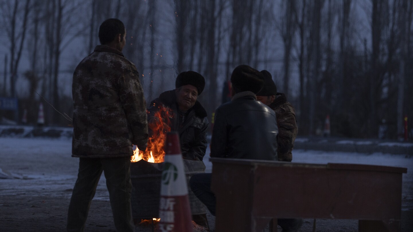 Thousands of people are forced out of their homes after 7.1 quake in western China | AP News