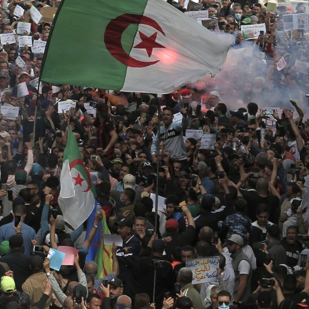 Algerian opposition parties call for a political dialogue in presidential election year | AP News