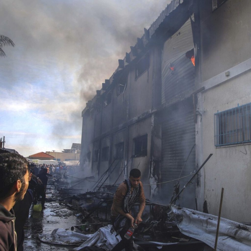 Live updates | Death toll rises to 12 with dozens injured in a strike on a crowded Gaza shelter | AP News