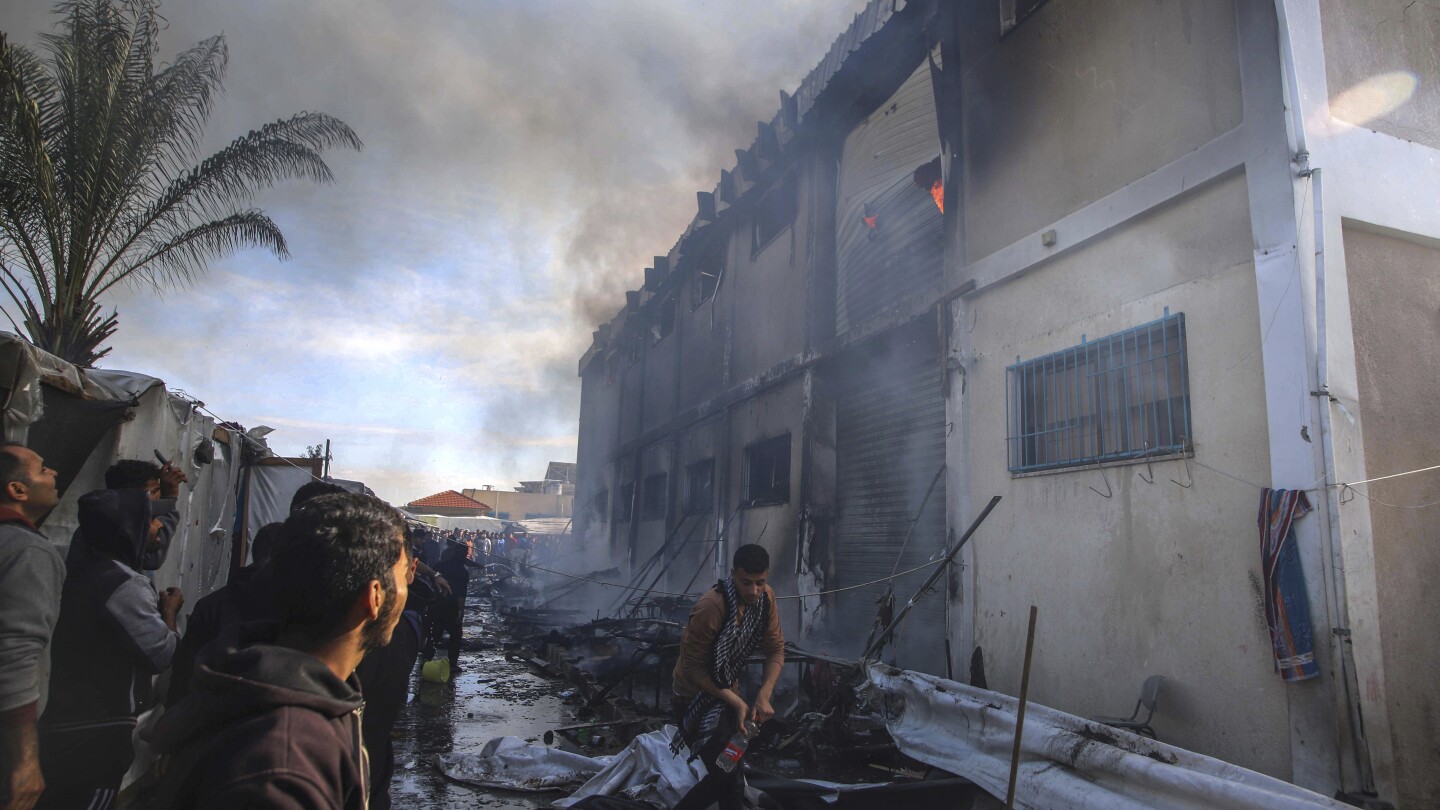 Live updates | Death toll rises to 12 with dozens injured in a strike on a crowded Gaza shelter | AP News