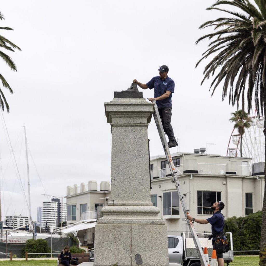 Australia: Monuments symbolizing colonial past damaged by protesters  | AP News