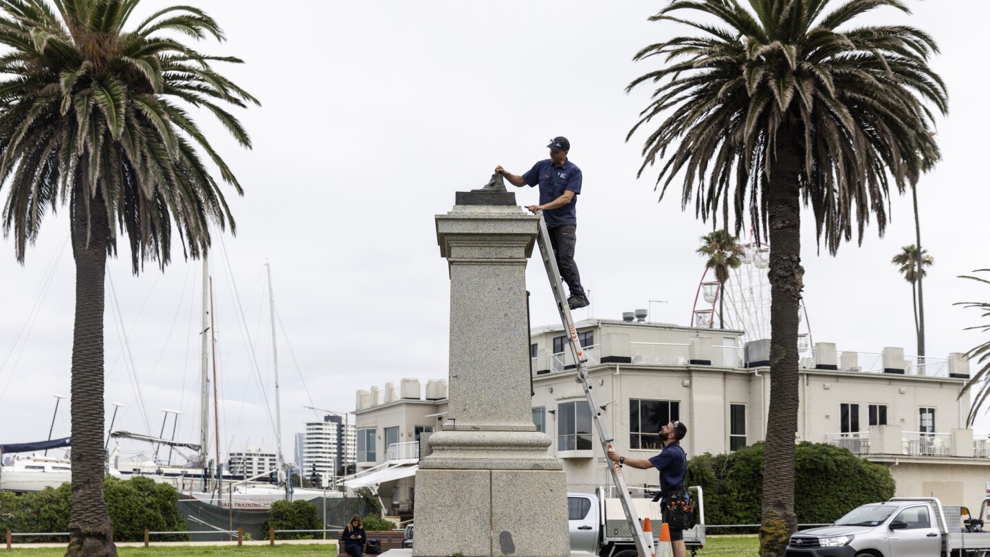 Australia: Monuments symbolizing colonial past damaged by protesters  | AP News