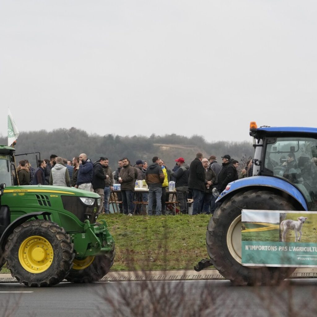 French farmers edge closer to Paris as protests ratchet up pressure on President Macron | AP News