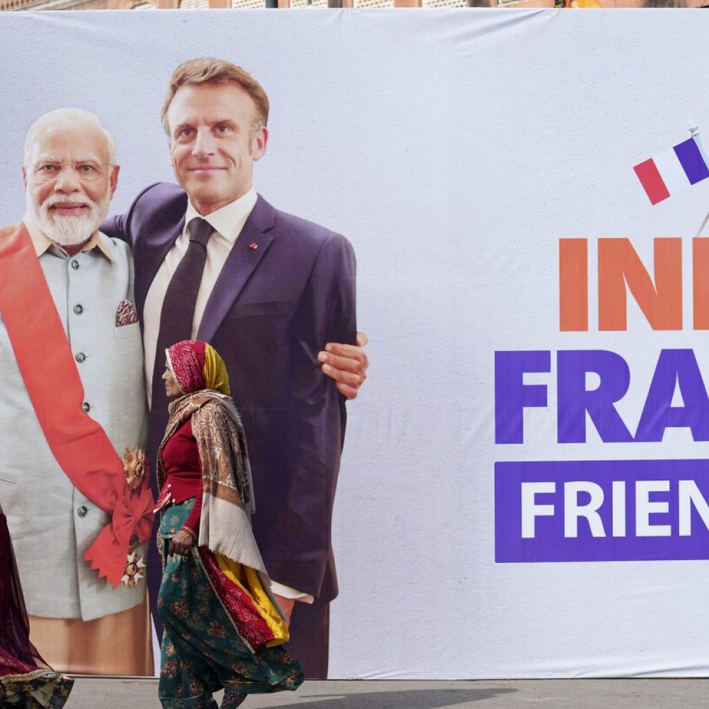 French President Macron arrives in India, where he’ll be chief guest at National Day celebrations | AP News