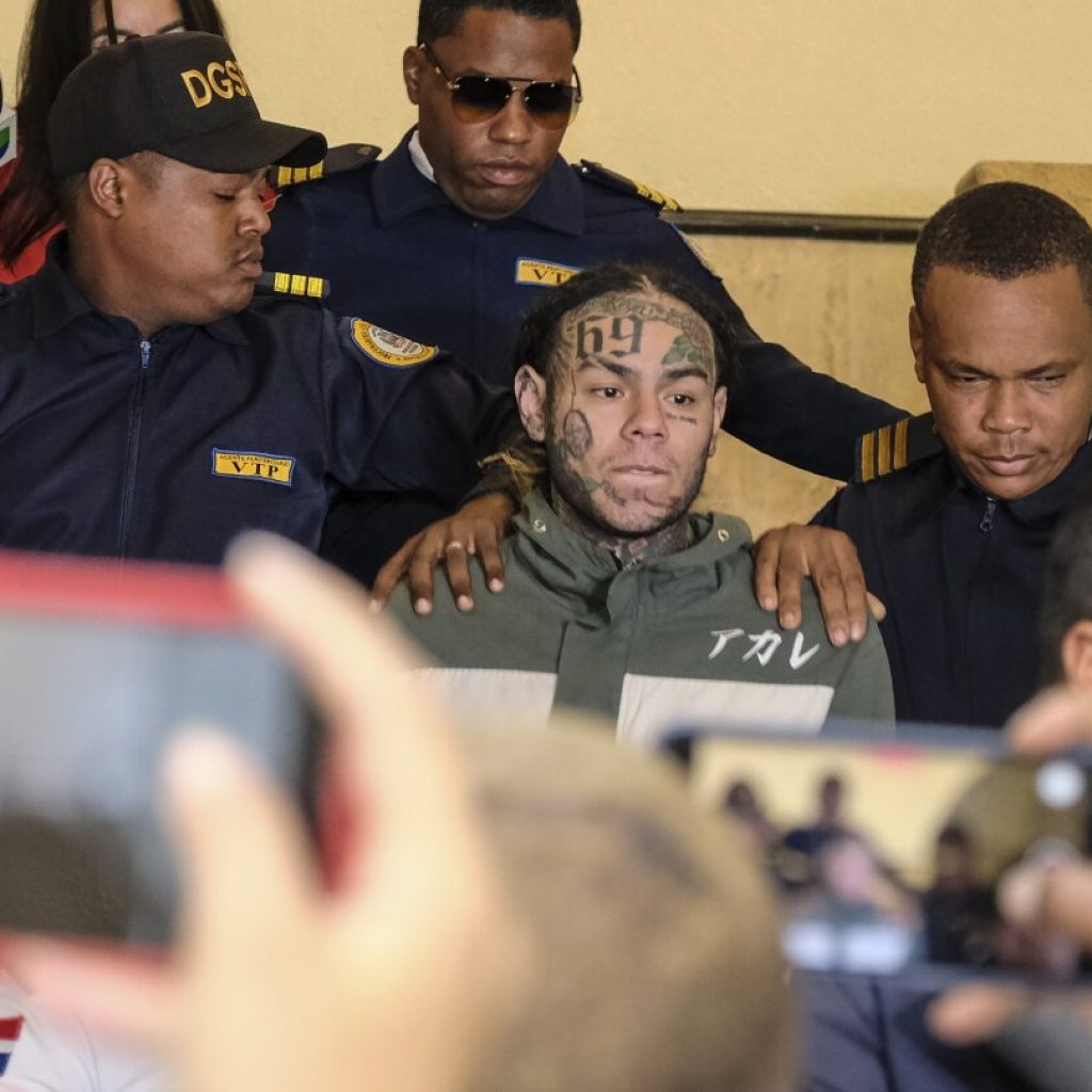 Dominican judge orders conditional release of US rapper Tekashi 6ix9ine in domestic violence case | AP News