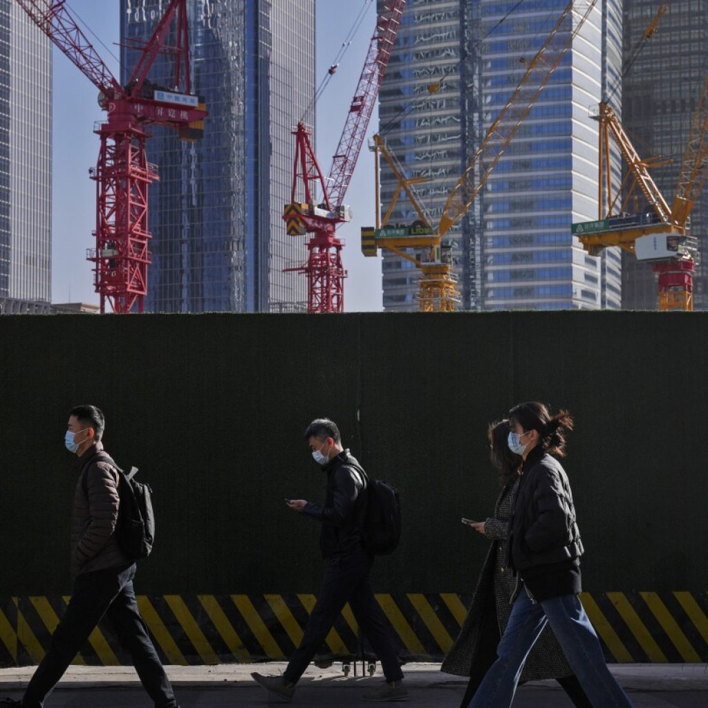 China doubles down on moves to mend its economy and fend off a financial crisis | AP News