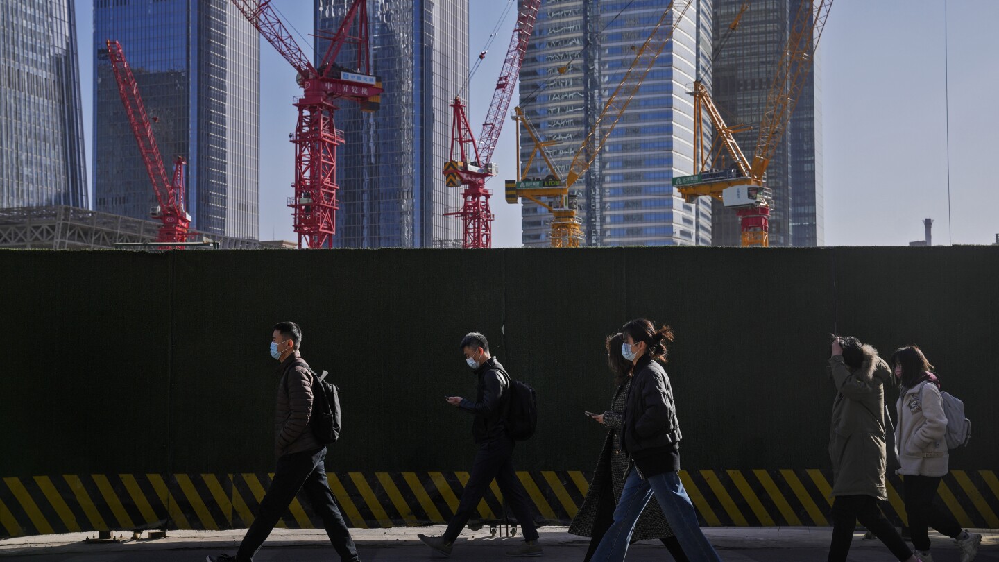 China doubles down on moves to mend its economy and fend off a financial crisis | AP News