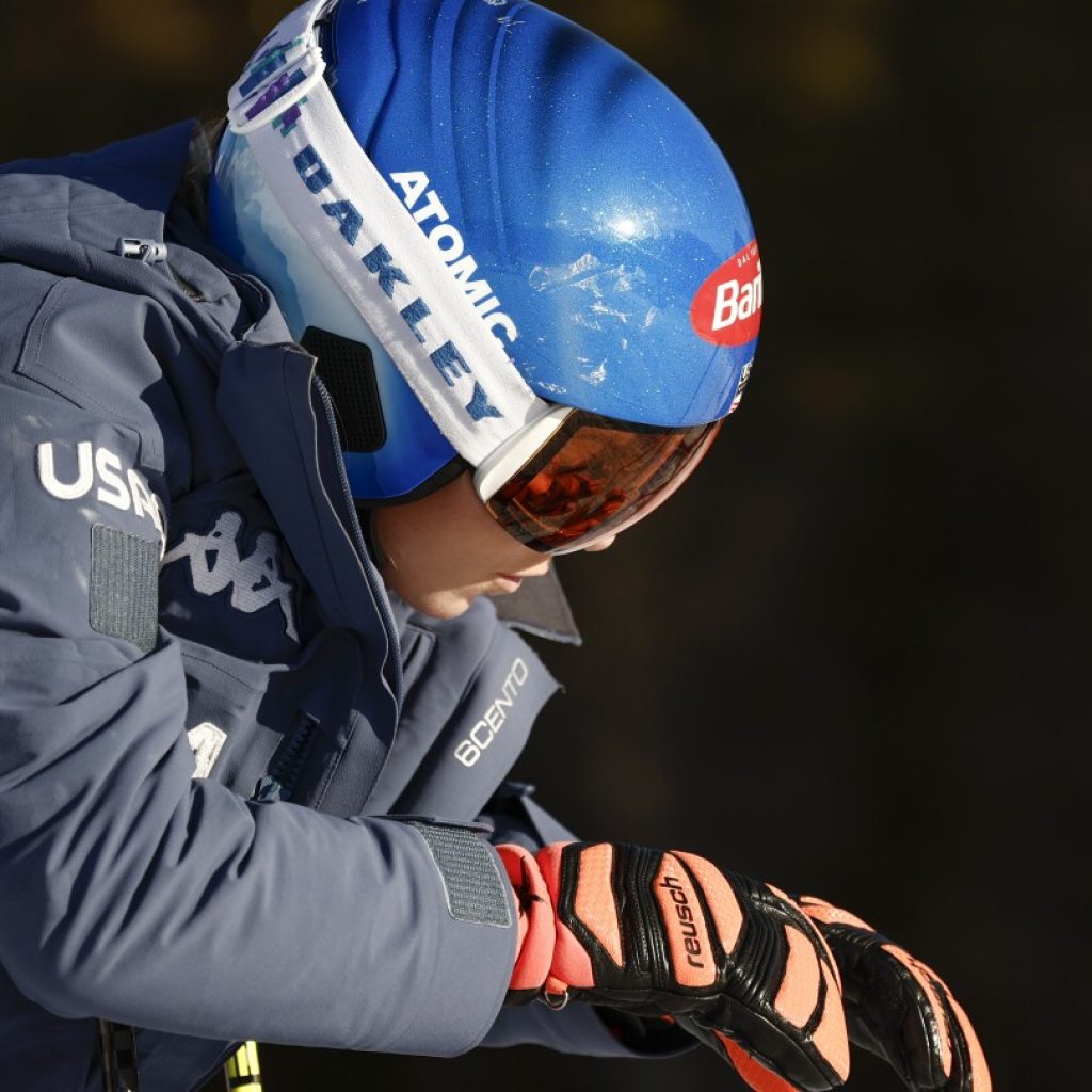 Shiffrin gets up after losing control and crashing while landing a jump in a World Cup downhill | AP News