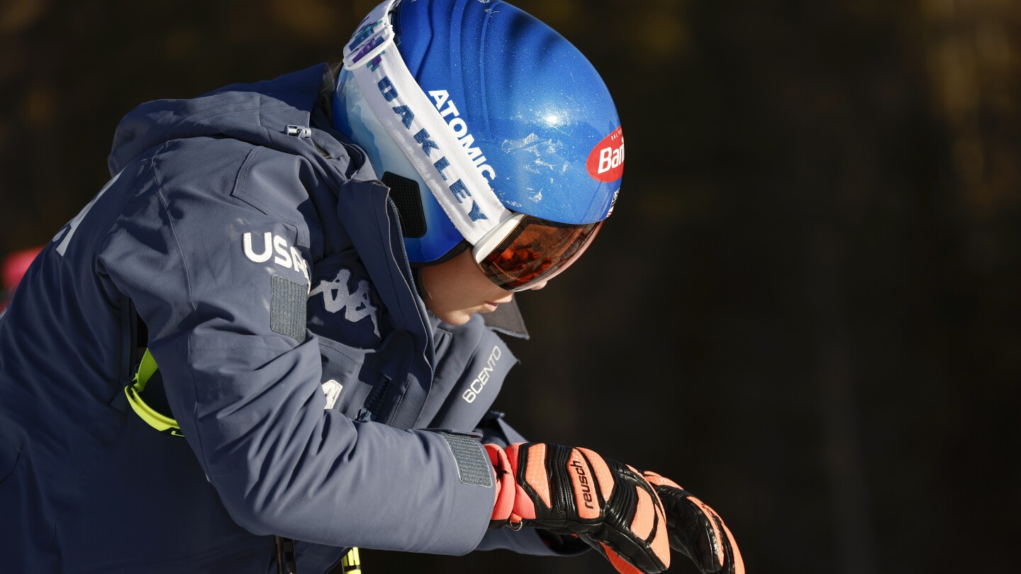 Shiffrin gets up after losing control and crashing while landing a jump in a World Cup downhill | AP News