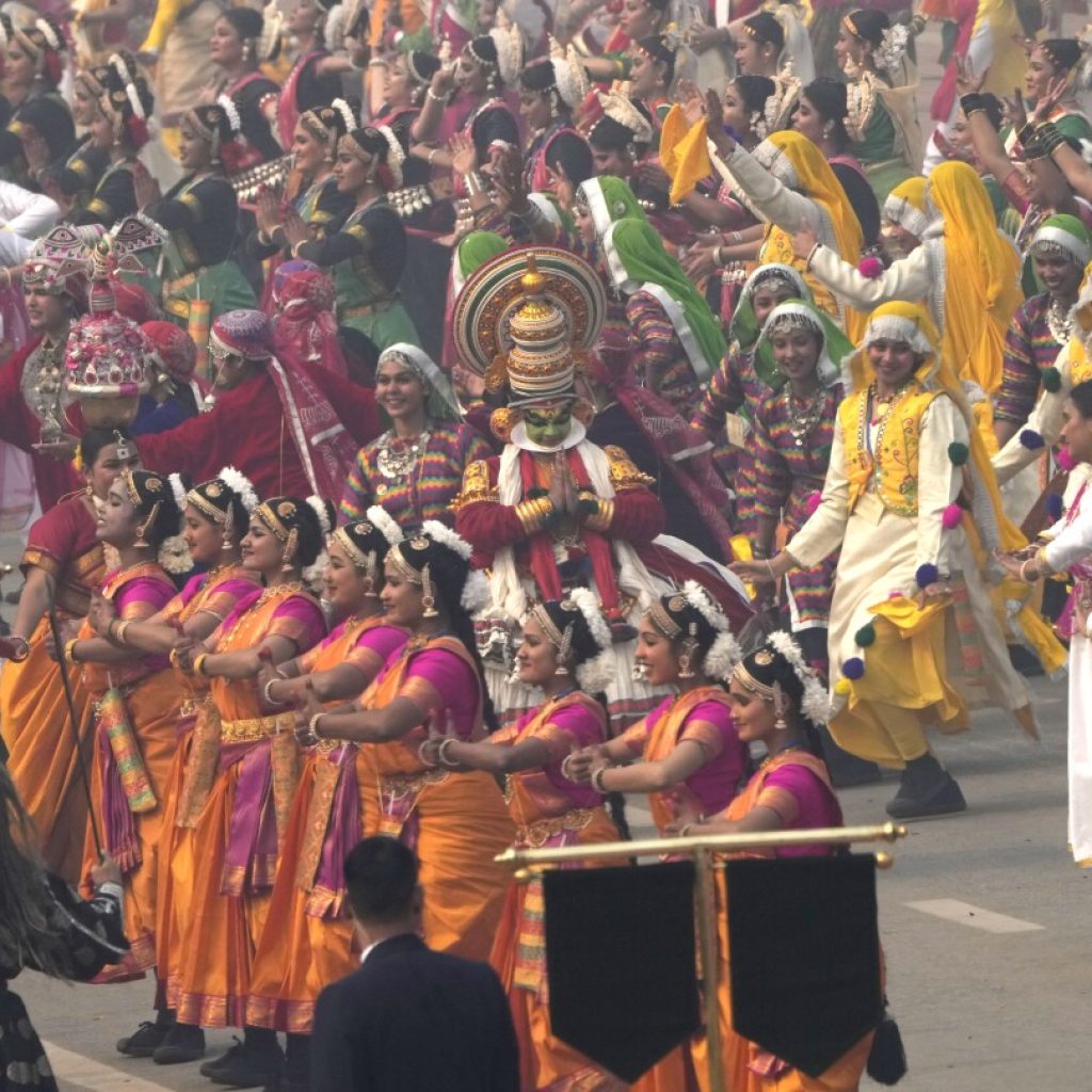 AP Photos: Indians rejoice in colorful Republic Day parade with the French president as chief guest | AP News