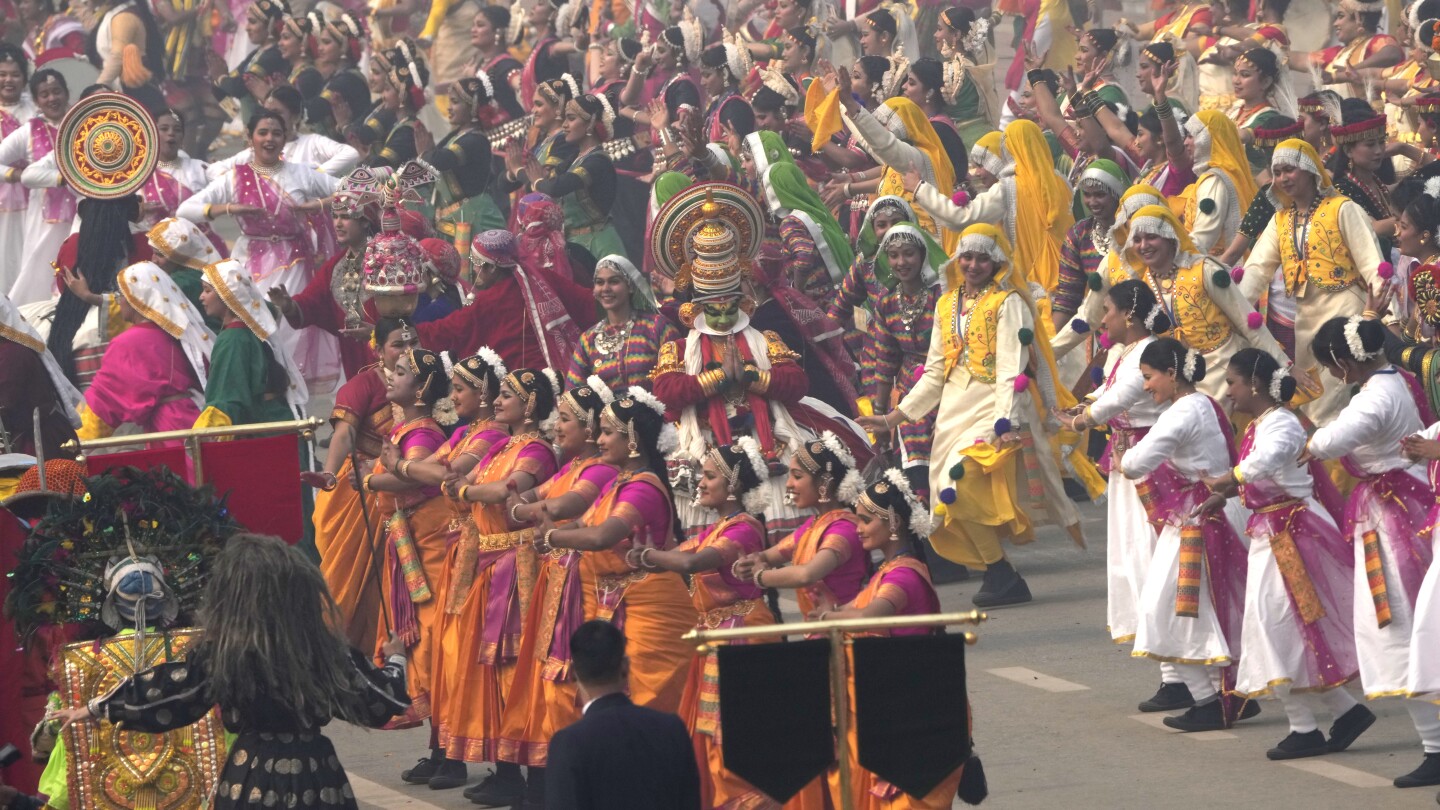 AP Photos: Indians rejoice in colorful Republic Day parade with the French president as chief guest | AP News