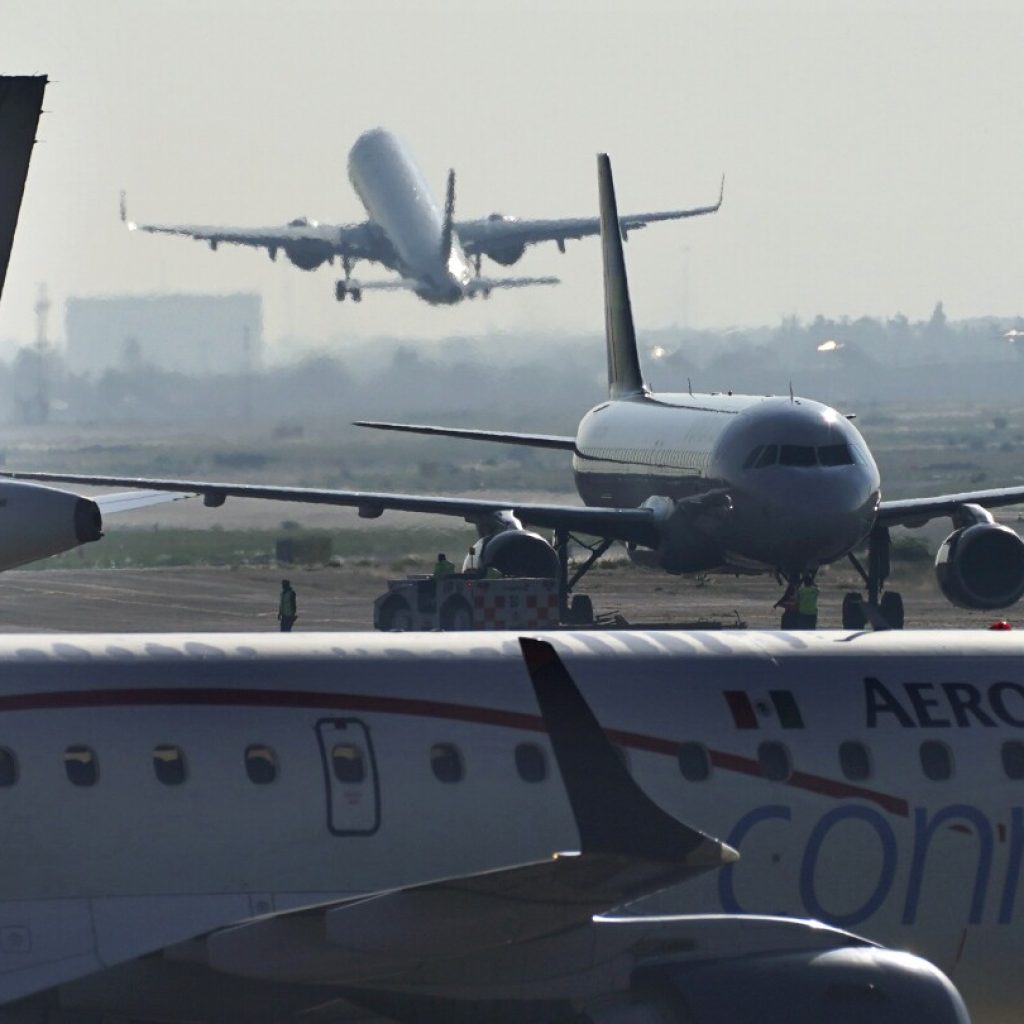 Other passengers support man who opened emergency exit and walked on plane’s wing in Mexico airport | AP News