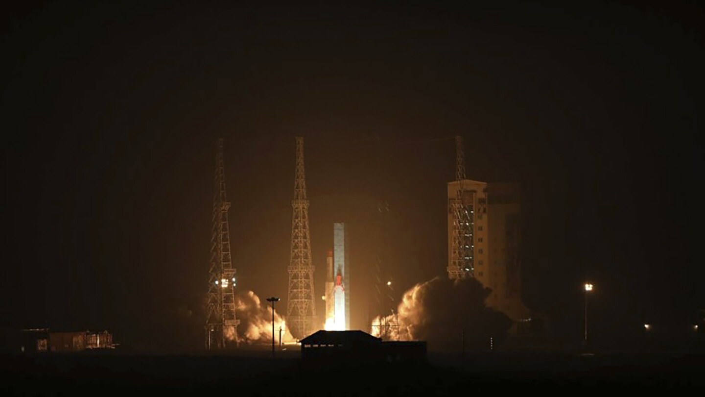 Iran launches three satellites into space  | AP News