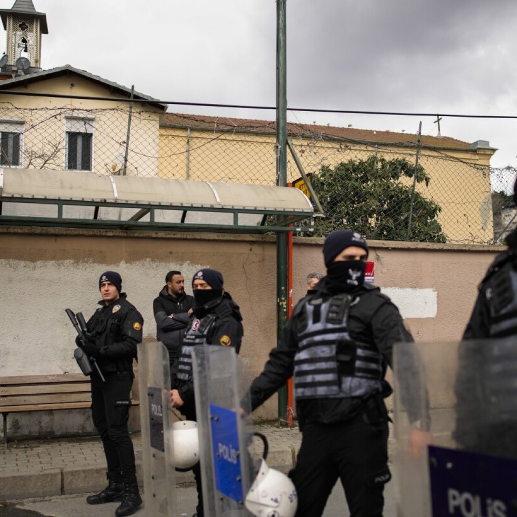 2 masked assailants attack a church in Istanbul and kill 1 person | AP News