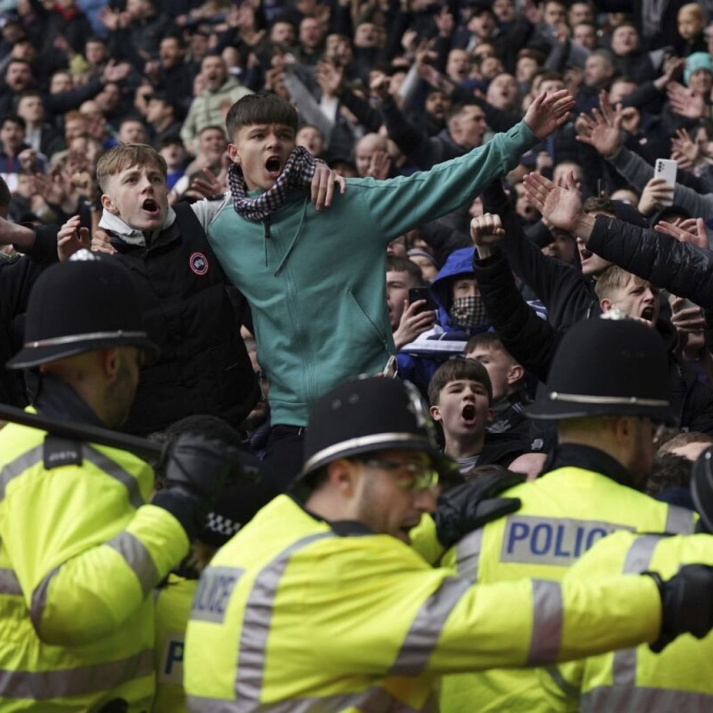 West Brom and Wolves soccer game stopped because of crowd trouble. FA launches investigation | AP News