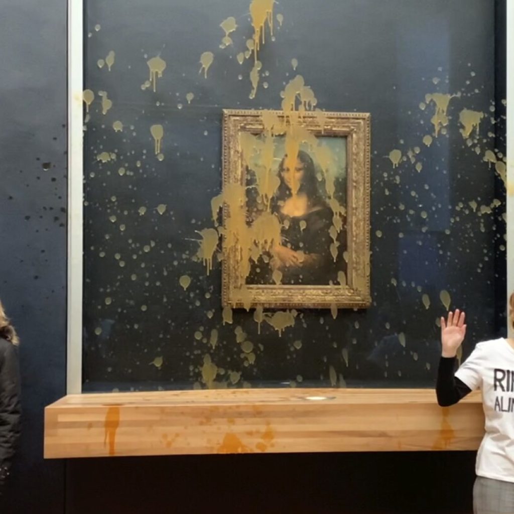 Climate activists throw soup at the ‘Mona Lisa’ in Paris | AP News