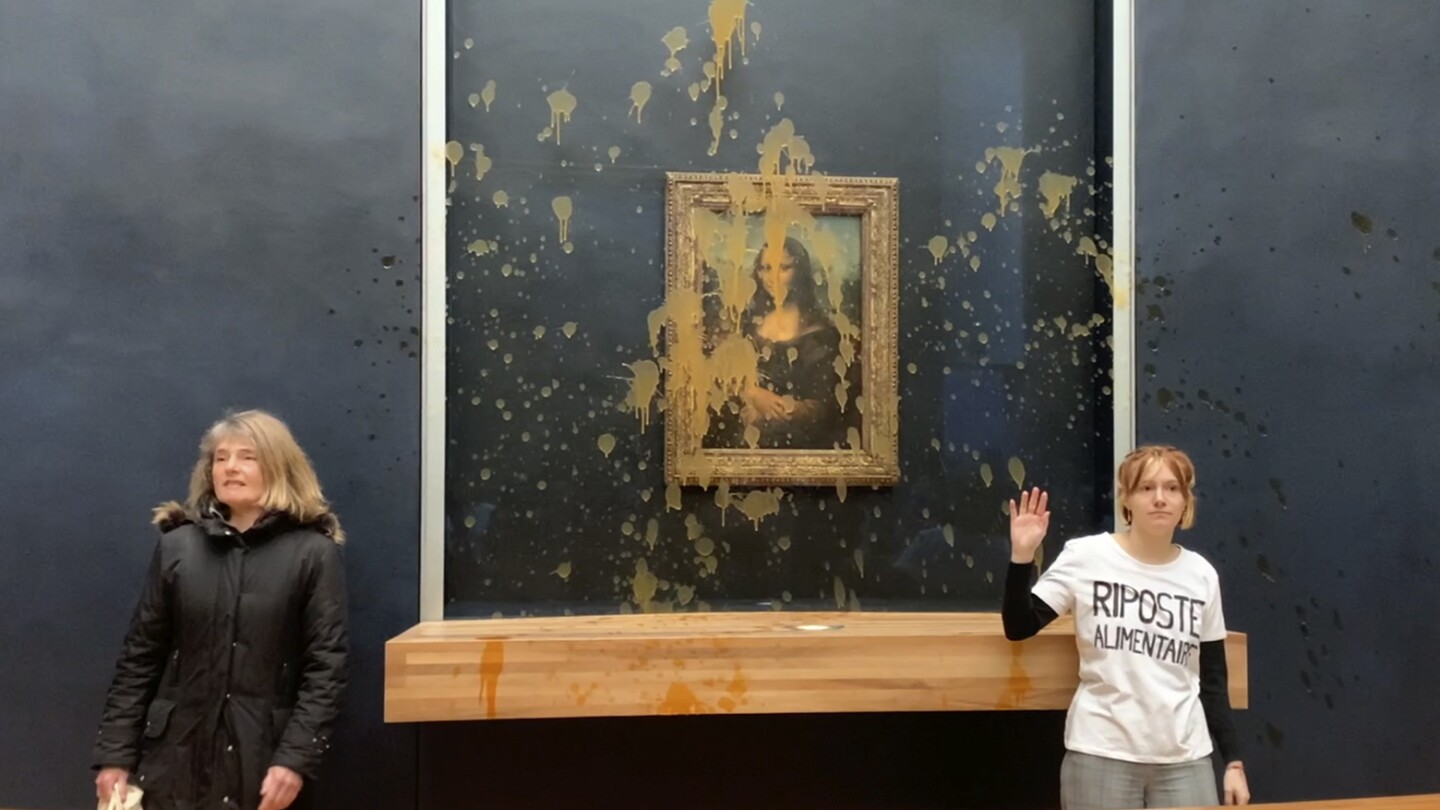 Climate activists throw soup at the ‘Mona Lisa’ in Paris | AP News