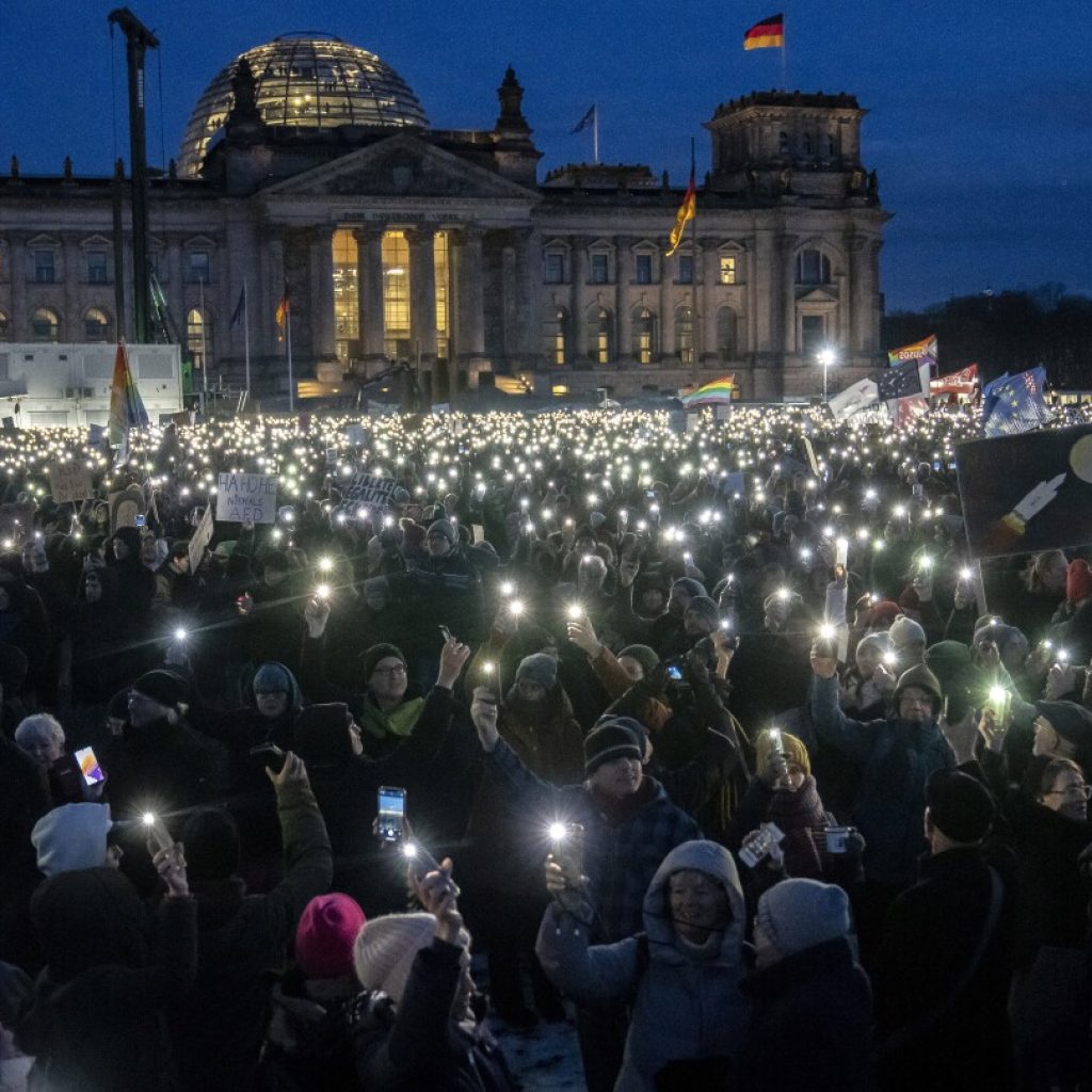 German president calls for alliance against extremism as protests against far right draw thousands | AP News