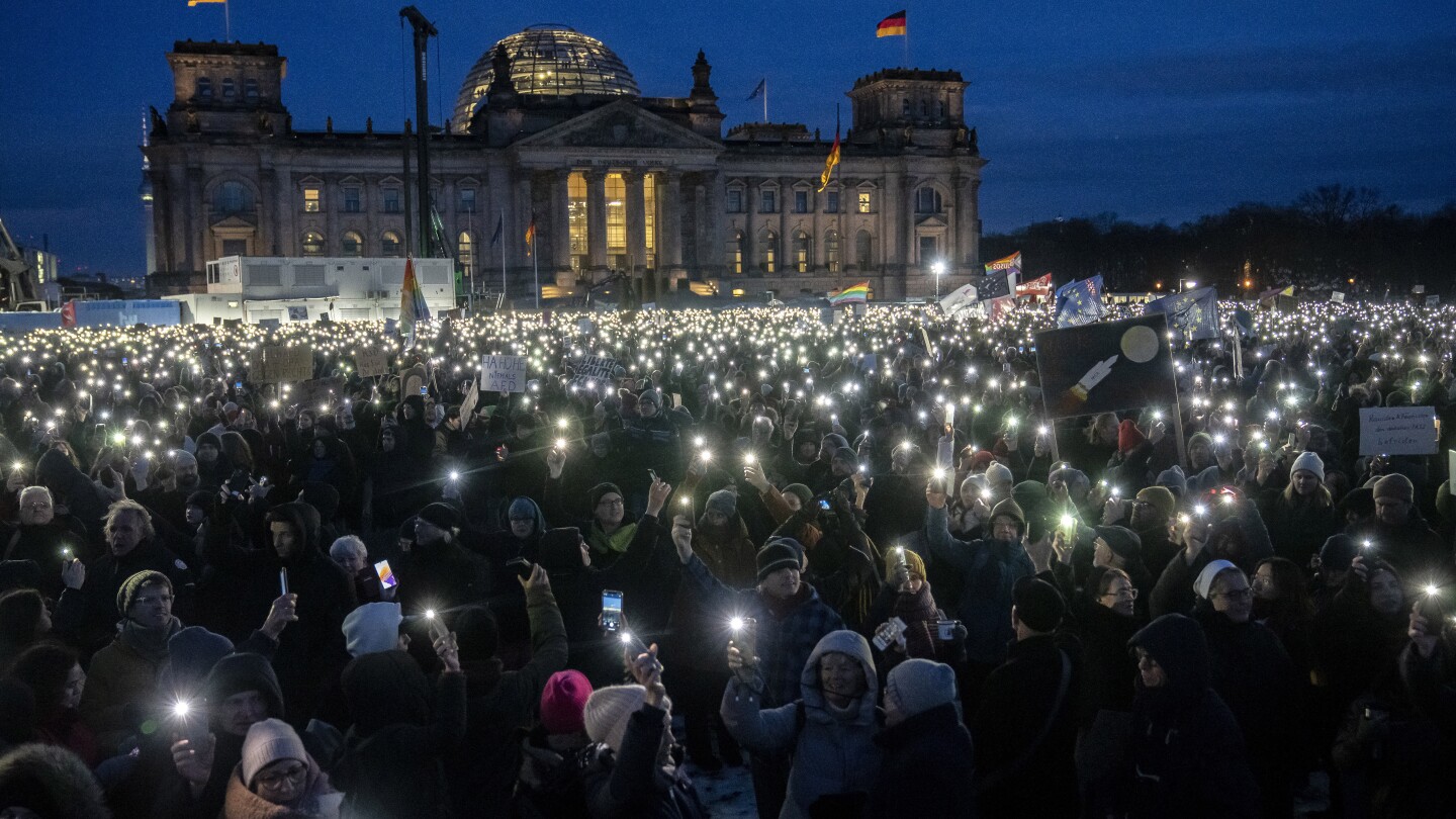 German president calls for alliance against extremism as protests against far right draw thousands | AP News