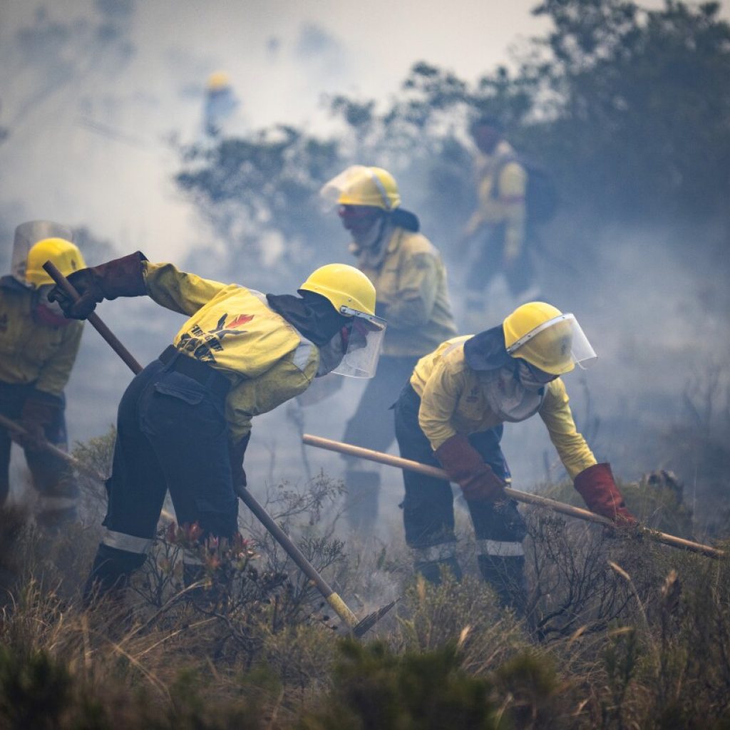 South Africa evacuates small coastal communities near Cape Town as wildfires burn out of control | AP News