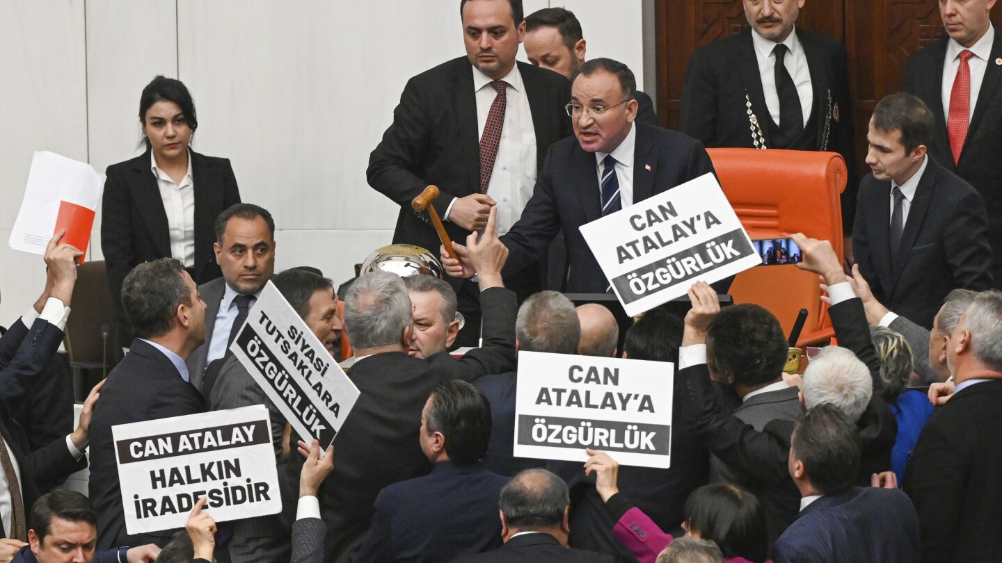 Turkish parliament strips imprisoned opposition lawmaker of seat | AP News